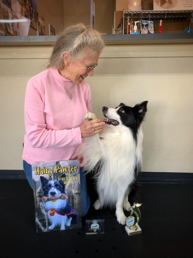 Amos, who made harry potter-themed presentation, alongside his coach